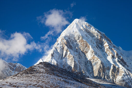 Pumori and Kala Patthar mountain summits on the Everest Base Camp trek in Himalayas. Nepal.