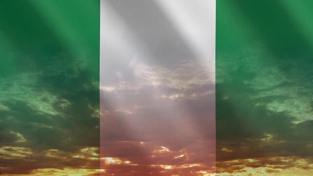 Flag of Nigeria waving against a vibrant sunset, creating a patriotic and inspiring atmosphere with warm tones.