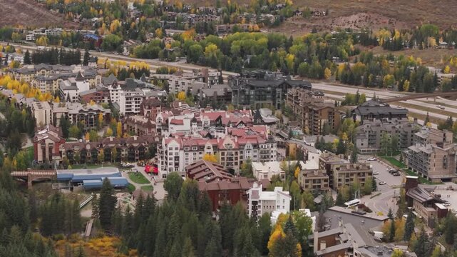 Vail town aerial view with beautiful fall mountains, Colorado 4K