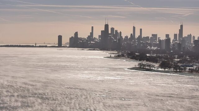 Aerial View of Chicago Skyline and Frozen Lake Michigan with Sea Smoke During Winter Deep Freeze on January 23, 2026
