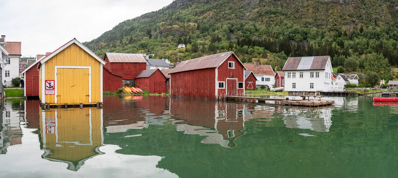 Old boathouses at the harbor of Solvorn village