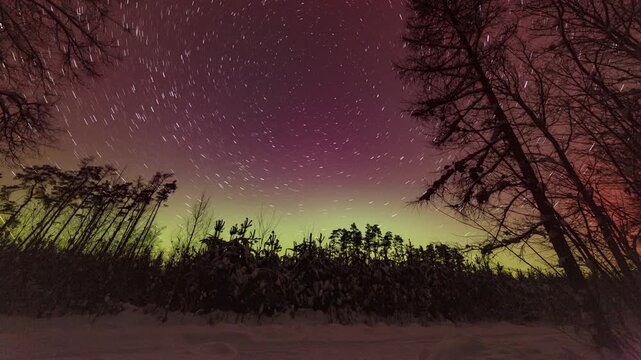 Startails and northern lights - 4k timelapse landscape.