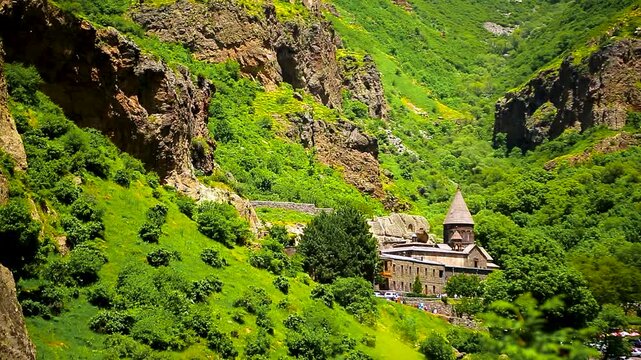 The medieval Armenian monastery of Geghard, which is located in the mountains, surrounded by forests