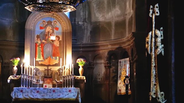 The interior of the medieval Armenian Geghard Monastery, which is located in the mountains, surrounded by forests