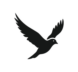 Obraz premium Black silhouette of a bird in mid flight with wings spread wide