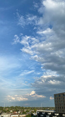 Stormy Clouds over Blue Sky