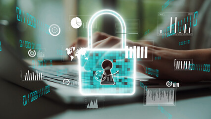 Fototapeta premium This image illustrates a digital security theme with a padlock graphic over a laptop, representing online safety measures and cyber security awareness in today tech-driven world. Xenic