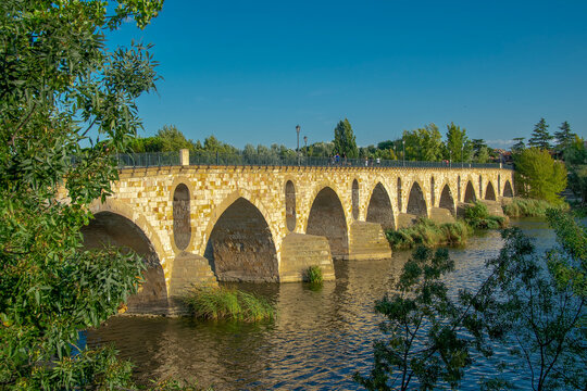 Stone arches of the medieval bridge in zamora city, spain