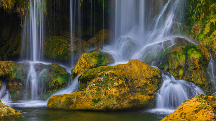 Kravica Waterfall cascades over mossy rocks in Bosnia and Herzegovina © Tomasz Wozniak