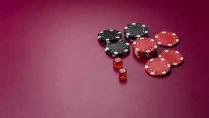 Casino dice and chips on a colored background, poker, gambling with bets. Dice and chips