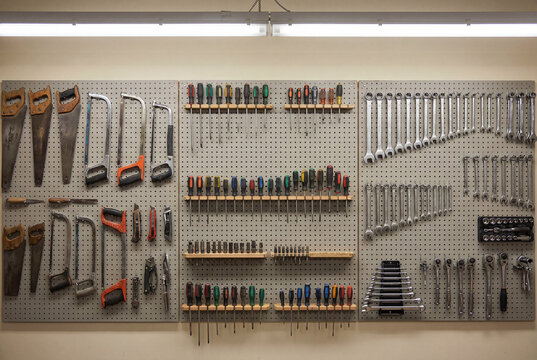 Organized tools on a pegboard in a workshop