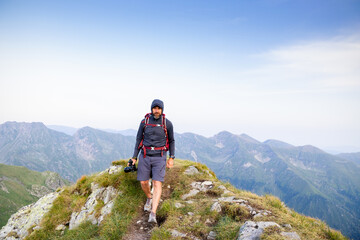Fototapeta premium trekking with a dog in hogh mountains