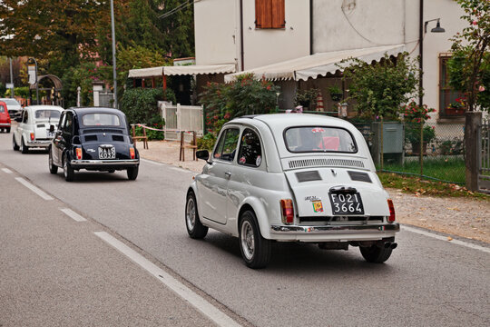 Line of custom vintage Fiat 500 cars at a classic car rally, on October 1, 2017 in Godo, Russi, RA, Italy