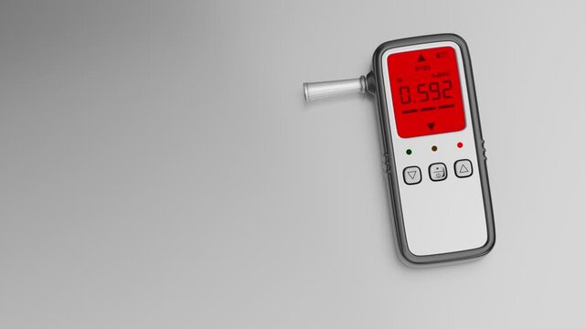 Digital breathalyzer showing high alcohol content on metal table