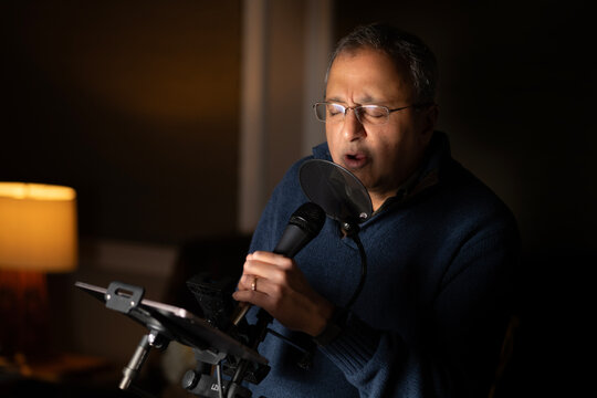 Man singing on a microphone 