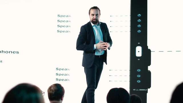 Chief product officer announces product launch with new smartphone reveal, advertising release of mobile device with sleek design. Introducing gadget coming soon at auditorium. Camera B.