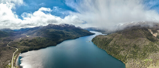 Aerial panoramic vista of a lake Falkner in mountain valley of Patagonia Argentina