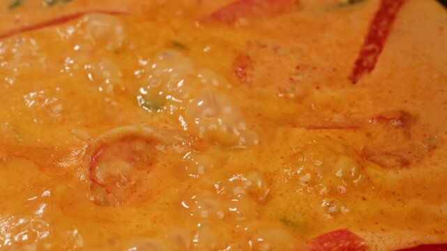Tamarind red prawn curry cooking, shrimps in tomato ginger sauce, asian kitchen, Chinese restaurant.