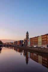 Naklejka premium dublin city buildings at sunset on the river