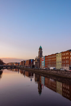 dublin city buildings at sunset on the river