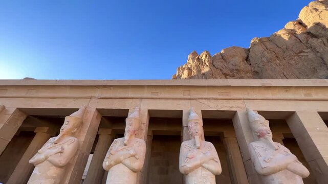Egypt, December 20, 2022: The Mortuary Temple of Hatshepsut at Deir el-Bahri. Located near the cliffs of Deir el-Bahri on the west bank of the Nile, near the Valley of the Kings. Ancient temple. 4K