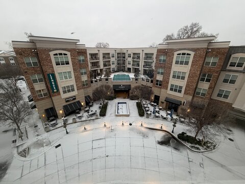 A rare snow ice winter storm covers the Lennox SouthPark apartments at Sharon Square in Charlotte, NC