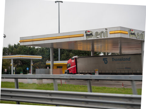 Eni gas station along Italian highway A4 in Friuli with Transland truck, showcasing transport and logistics