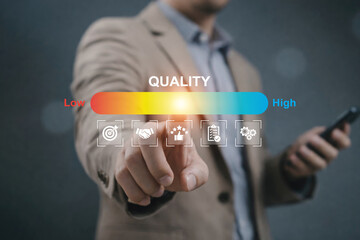 Businessman touching digital quality rating slider from low to high showing performance measurement, service quality improvement, customer experience, quality assurance and business evaluation concept