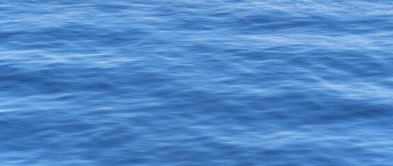 Light blue smooth water texture as a background