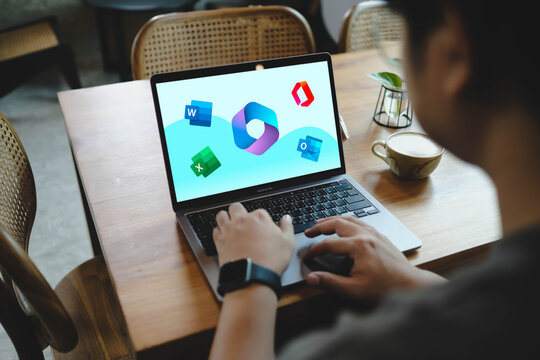 Bangkok, Thailand. January 27, 2026; A person using the Microsoft 365 suite on a MacBook Pro, featuring logos for Word, Excel, Outlook, and M365 Copilot.
