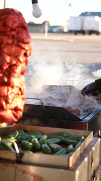 Slow Motion Al Pastor Meat with Smoke on a Rotating Spit
