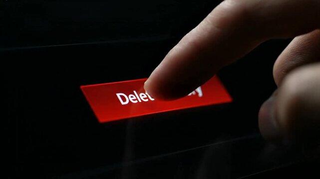 Finger Pressing Delete Button on Screen.