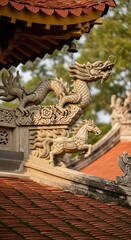 Fototapeta premium Stone mythological carvings adorn the ornate rooftop eaves of an East Asian religious structure