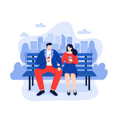 Naklejka premium A couple sitting on a bench in a city park enjoying their drinks on a casual day out together