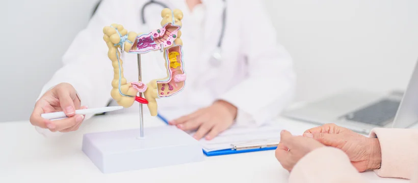 Elderly woman Patient consultation with doctor for Colon disease, Large Intestine, Colorectal cancer, Ulcerative colitis, Diverticulitis, Irritable bowel syndrome, Digestive system and Healthcare