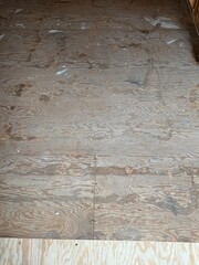 A plywood subfloor in a kitchen