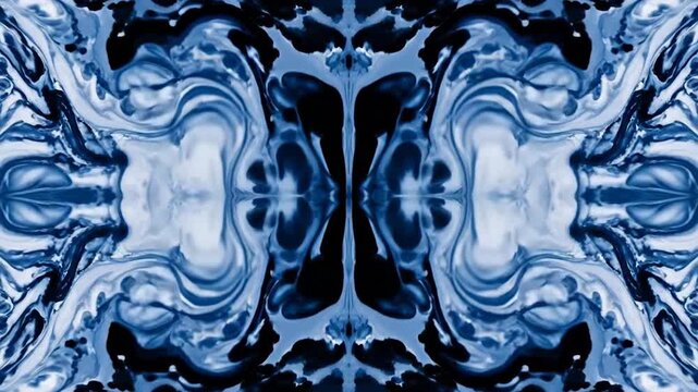 Abstract symmetrical pattern with swirling blue and white ink, creating a mesmerizing visual effect.