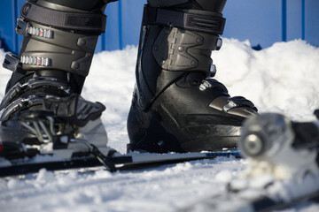 Close Up Of Ski Boots With Bindings On Snow For Winter Sports Photography