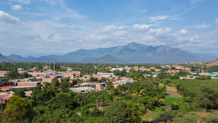Aerial drone panoramic natural landscapes of Lambayeque, Peru, featuring forests, agricultural fields, and rural scenery near main cities and villages, ideal for tourism, marketing and graphic design