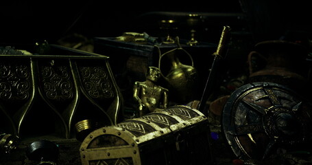 Golden treasure chest surrounded by artifacts, opulent jewelry, aged coins and ornate goblets under moody low light, creating mysterious antique hoard © icetray