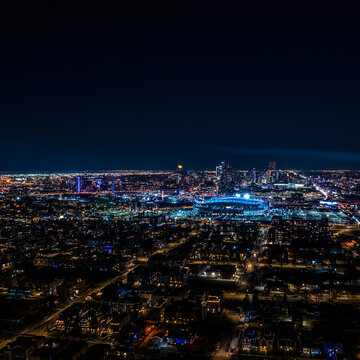 Night view of Denver skyline with red moon, drone photo, Denver, Colorado