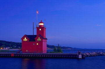 red lighthouse at night