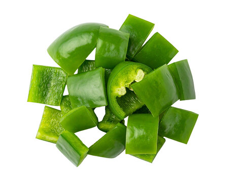 Vibrant green pepper chunks, artfully arranged on a dark background