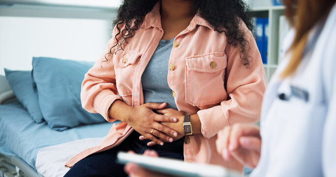 Pain, gynecologist and doctor with woman in hospital for consulting, appointment and endometriosis. Healthcare, clinic and person with patient for miscarriage, medical service and fertility crisis