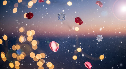Fototapeta premium Dreamy winter bokeh background with golden lights, falling snowflakes, and pink rose petals on twilight gradient sky.