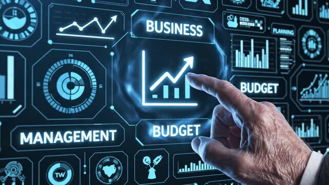 Hand pointing to business budget graph on futuristic digital interface displaying financial management data and statistics