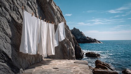 Clothes drying on a clothesline by the sea (1)