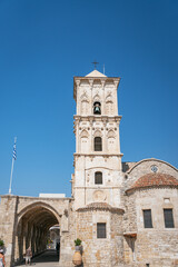Obraz premium Historic Church of Saint Lazarus and bell tower against a clear blue sky