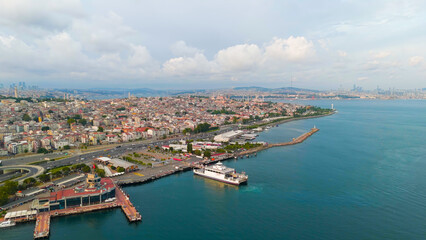 Fototapeta premium Istanbul, Turkey. Bosphorus embankment. Historical city center. Fatih district. Cloudy weather at sunset, Aerial View