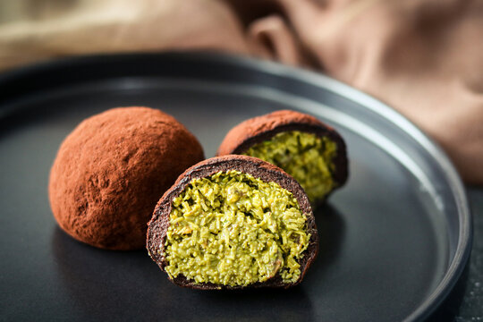 Dubai Chewy Cookie split open, showing a rich pistachio and kataifi filling.